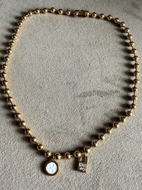 UNO de 50 Gold Beaded Necklace with White Charm